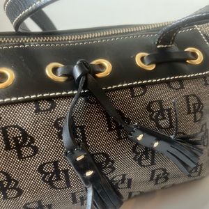 Woman’s Dooney & Bourke handbag